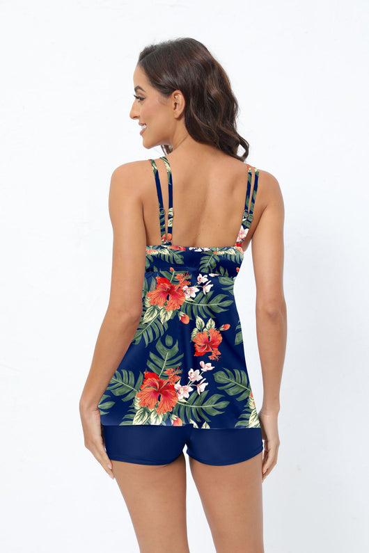 Women's plus size two-piece swimsuit with a red floral print tankini top and black boxer swim shorts. - Image 26