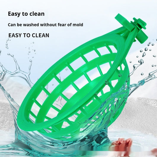 Green plastic bird nest with a grid design and an attached clip, measuring approximately 17.5cm wide. - Image 3