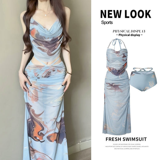 Purple and brown tie-dye two-piece swimsuit with a ruched cowl neck halter top and a matching high-waisted skirt. - Image 6