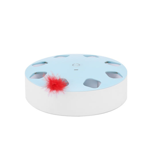 Light blue circular cat teaser toy with multiple cutouts and a red feather extending from one opening. - Image 4