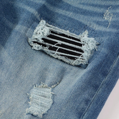 Jeans Vintage Desgastados con Parches de Cuero y Diseño Patchwork para Hombre - Image 27