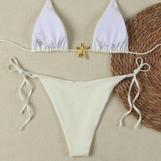 White women's bikini with triangle top and tie-side bottom, featuring a gold starfish charm on the center front. - Image 2