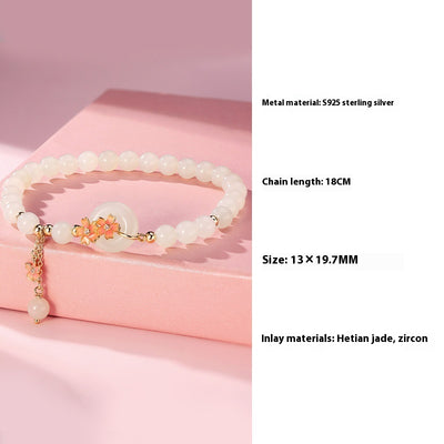 Joya de Jade Hetian con Plata 925 - Diseño Flor de Cerezo Estilo Mori Elegante - Image 5