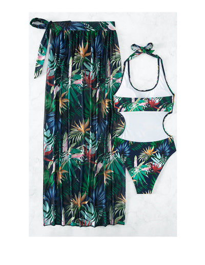 Yellow tropical print three-piece bikini set with halter top, high-waisted bottoms, and long cover-up skirt with high slit. - Image 11