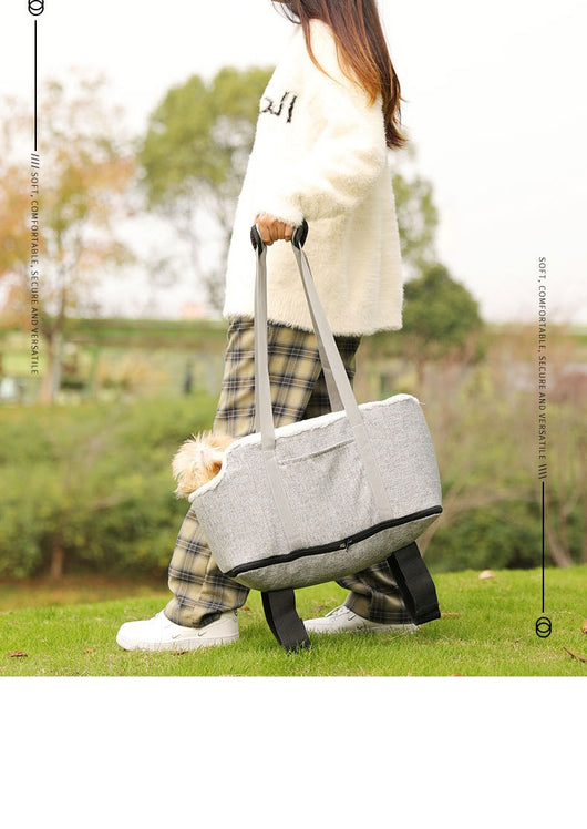 Grey pet car seat with plush white lining, designed for small dogs or cats, placed on a car's center console. - Image 12