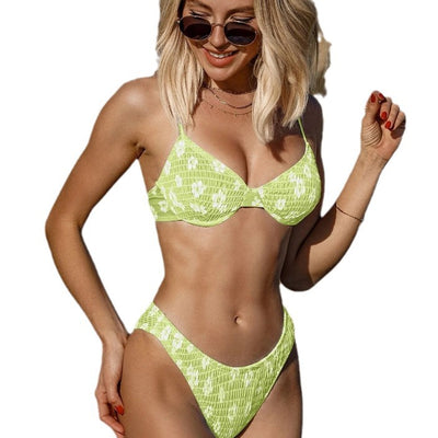 Periwinkle blue two-piece swimsuit with white floral pattern and ruched texture, featuring an underwire bikini top and high-cut bottoms. - Image 5