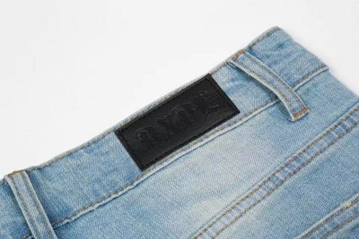 Jeans Rotos con Cierres y Detalles Desgastados - Image 9