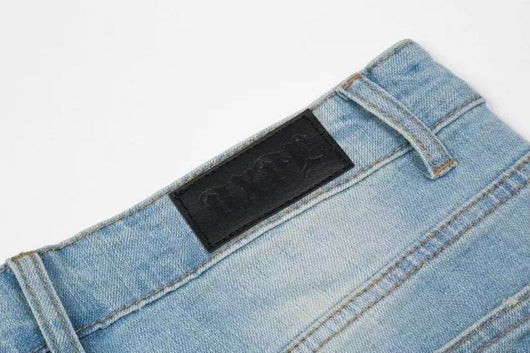Jeans Rotos con Cierres y Detalles Desgastados - Image 9