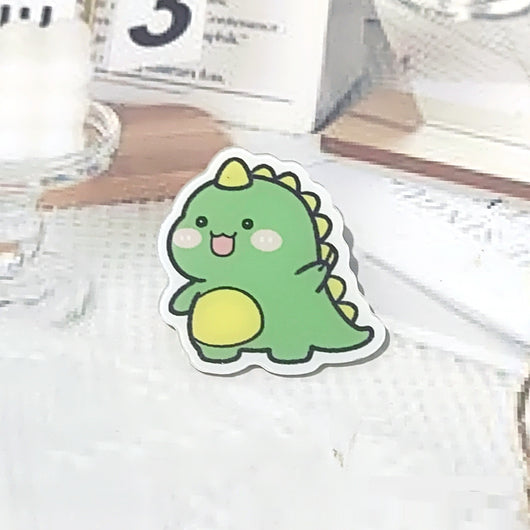 Cute green cartoon dinosaur acrylic badge brooch with a shy expression and small spikes on its back. - Image 25