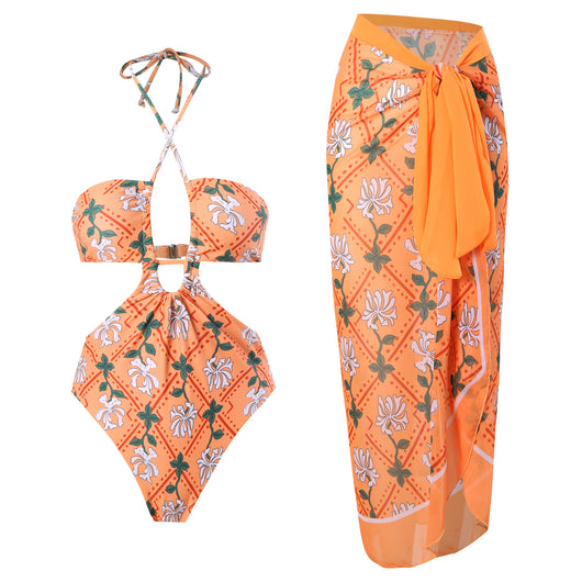 Dark green floral one-piece swimsuit with halter neck, bandeau top, cut-outs, and matching sheer sarong. - Image 21
