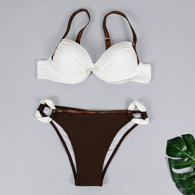 Women's two-piece swimsuit with a pink pleated bandeau top and brown bikini bottoms with pink accents, by the ocean. - Image 21