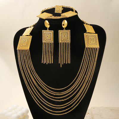 5-piece gold-plated jewelry set with multi-layered tassel necklace, matching dangle earrings, bracelet, and square ring. - Image 9