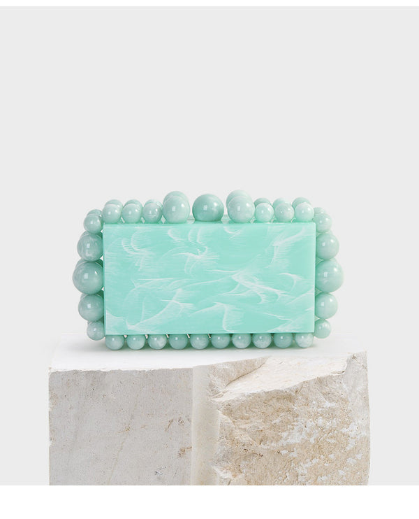 Clutch Marmolado con Perlas Grandes y Pequeñas