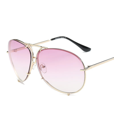 Aviator sunglasses with light blue lenses and a gold-colored metal frame, featuring a double bridge design. - Image 10