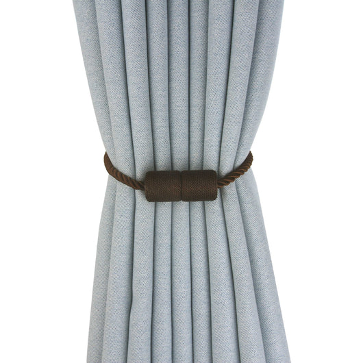 Black cylindrical magnetic curtain tieback holding a light blue pleated curtain, against a clean white background. - Image 8