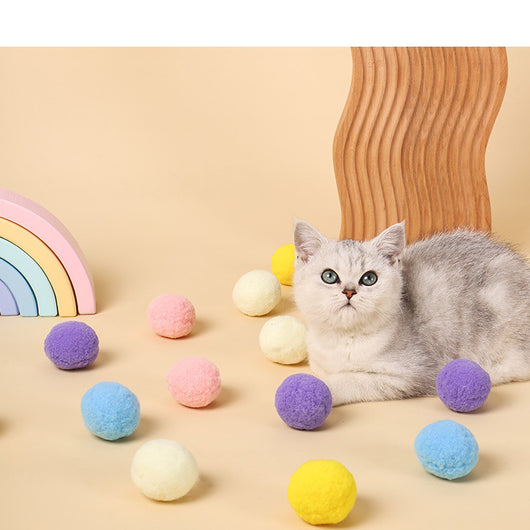 Five colorful plush balls in a white gift box, including pink, yellow, blue, purple, and bright yellow. - Image 3