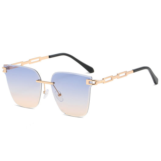 Frameless oversized square sunglasses with brown gradient lenses and gold-tone metal temples, featuring decorative black studs. - Image 7