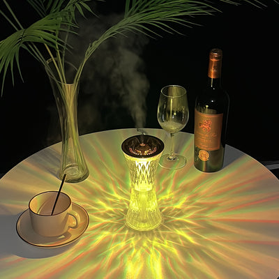 Rose gold and clear crystal-like desktop humidifier with a faceted body and an atmosphere lamp function. - Image 10