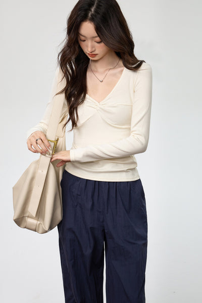 Blusa Elegante Escote Profundo con Nudo y Manga Larga - Image 24