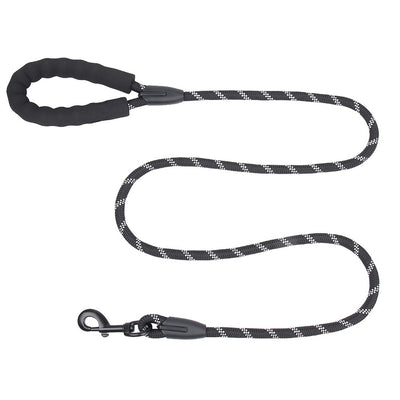 Purple pet harness with reflective straps, a top handle, and a metal D-ring for leash attachment. - Image 11