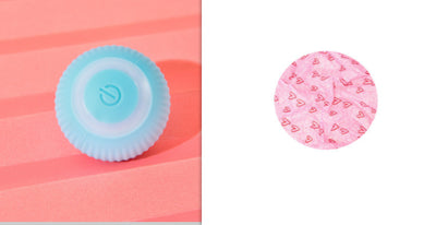 Pink round electronic cat toy with power symbol and a circular cat play mat with cartoon animals and pink border. - Image 15