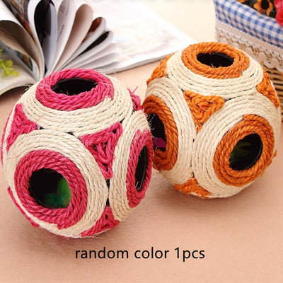 Two sisal cat toys, one pink and natural, one orange and natural, with multiple holes and feathers inside. - Image 5
