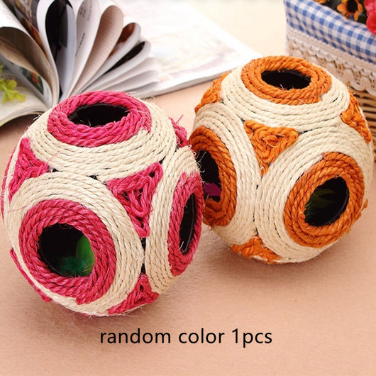 Two sisal cat toys, one pink and natural, one orange and natural, with multiple holes and feathers inside. - Image 5