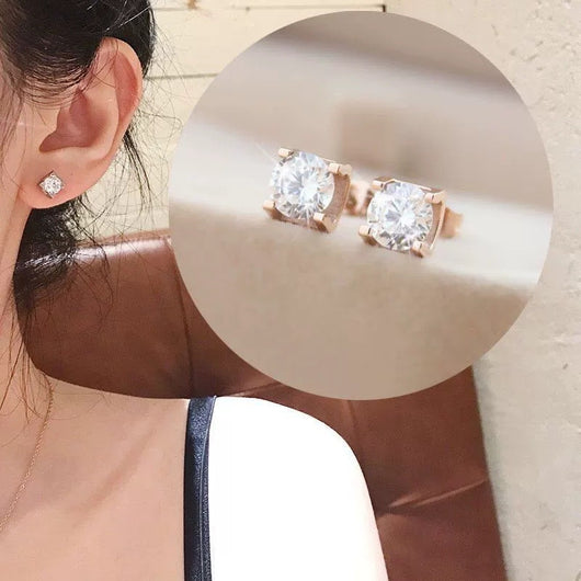 Delicate silver-colored chain necklace with a single square-cut clear stone pendant in a four-prong setting on a woman's neck. - Image 9