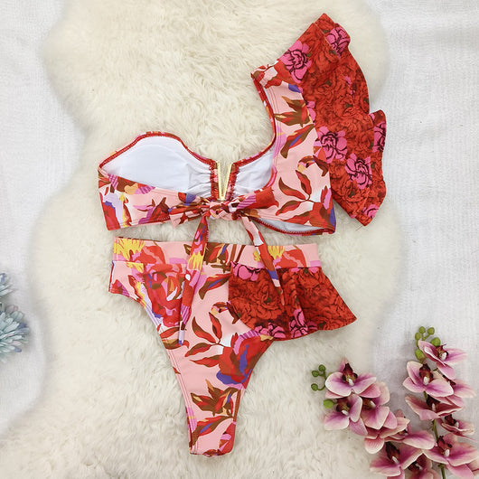Women's one-shoulder ruffled bikini with a vibrant red and pink floral print, high-waisted bottoms. - Image 15