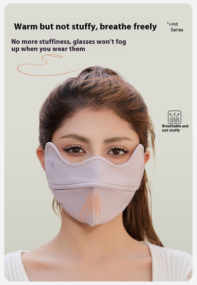 Woman wearing a grey outdoor cycling wind mask with ear hooks and a small heart logo, designed for cold-proof eye protection. - Image 19
