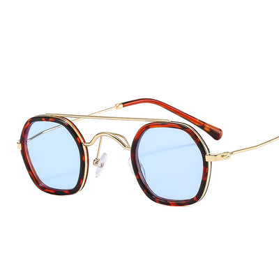 Green hexagonal frame sunglasses with blue to peach gradient lenses and gold-tone double bridge and temples. - Image 4
