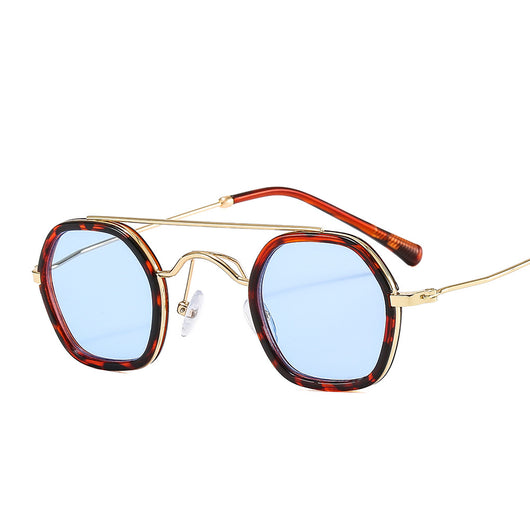 Green hexagonal frame sunglasses with blue to peach gradient lenses and gold-tone double bridge and temples. - Image 4
