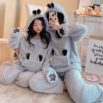 Parent and child wearing matching gray coral fleece hooded homewear sets with animal ears and paw print details. - Image 9
