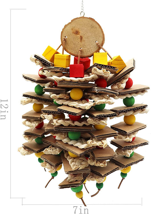 Parrot gnawing toy made of stacked cardboard, corn husks, and colorful wooden beads, with a parrot perched nearby. - Image 3
