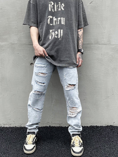 Jeans Slim Fit Desgastado con Roturas Estratégicas y Efecto Tinta - Image 9