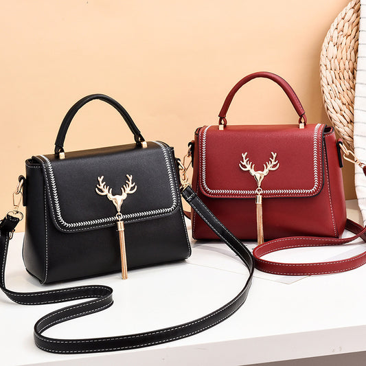 Bolso de Hombro con Cabeza de Venado y Borlas - Diseño Moderno para Mujer