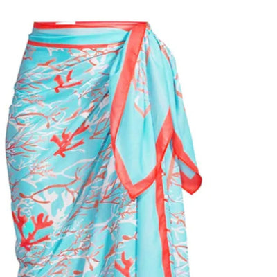 Women's light blue bikini with red coral print, featuring a halter top, high-cut bottom, and matching sarong. - Image 5