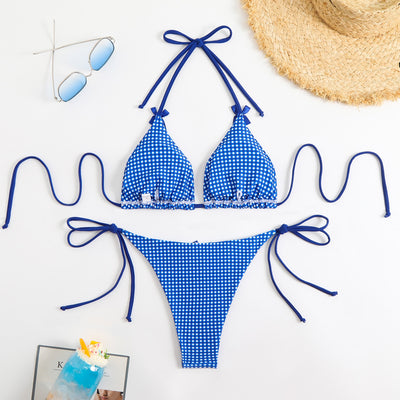 Blue and white gingham plaid bikini swimsuit with triangle top and thong bottom, featuring white tie straps and bows. - Image 15
