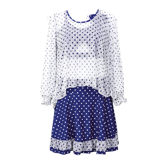 Woman in a cute and sweet three-piece swimsuit with a sheer white polka dot long-sleeve top and navy blue polka dot swim skirt. - Image 15