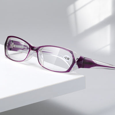 Red and clear retro full-frame reading glasses with blue light blocking lenses and a +2.00 prescription.