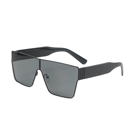 Oversized square sunglasses with a gold metal frame, dark gray lenses, and black plastic temples. - Image 5