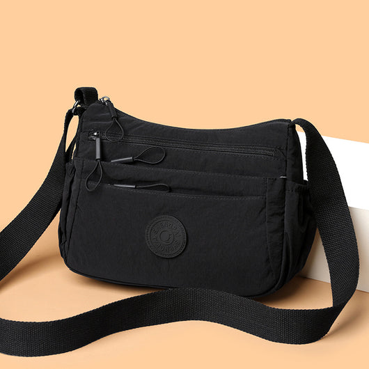 Bolsa Mensajera Casual Ligera Multicompartimento Diseño Simple - Image 4