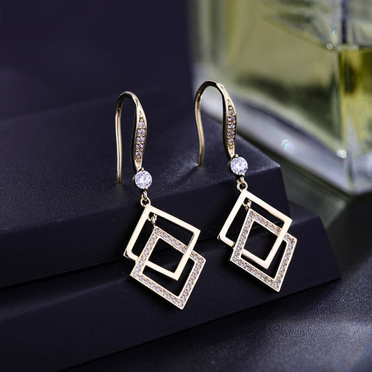 Aretes Geométricos de Diamante - Diseño Femenino Elegante