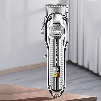 Silver electric hair clipper with LED display, six colorful guide combs, USB charging cable, cleaning brush, and oil.