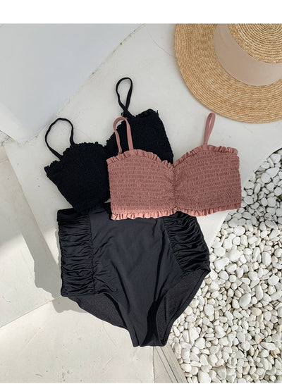 Women's retro high-waisted split bikini with a pink shirred bandeau top and black ruched bottoms. - Image 17