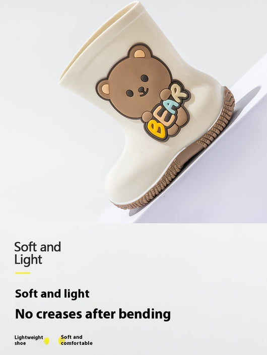White children's rain boots with a brown cartoon bear holding colorful 'BEAR' lettering and a white fleece lining. - Image 14