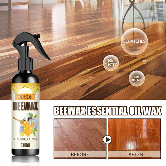 Black spray bottle of OUHOE Beeswax Essential Oil Wax, 120ml, for furniture and floor care.