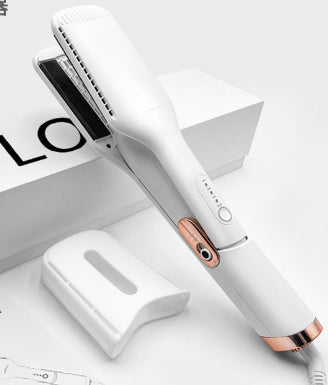 Black two-in-one hot air hair curler and straightener with a protective cap, temperature settings, and power button. - Image 5
