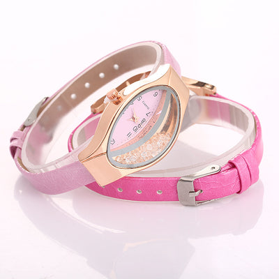 Reloj de Mujer Forma Ojo Cuarzo con Correa Quicksand y Perlas Giratorias - Image 13