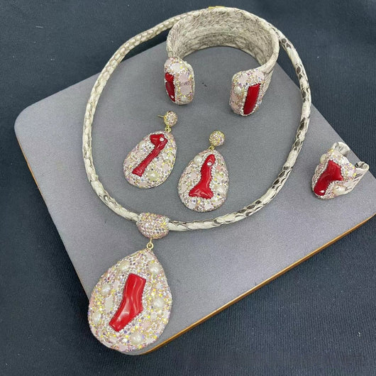 Four-piece jewelry set with white snakeskin leather, red coral-like inlays, pearls, and gemstones. - Image 9